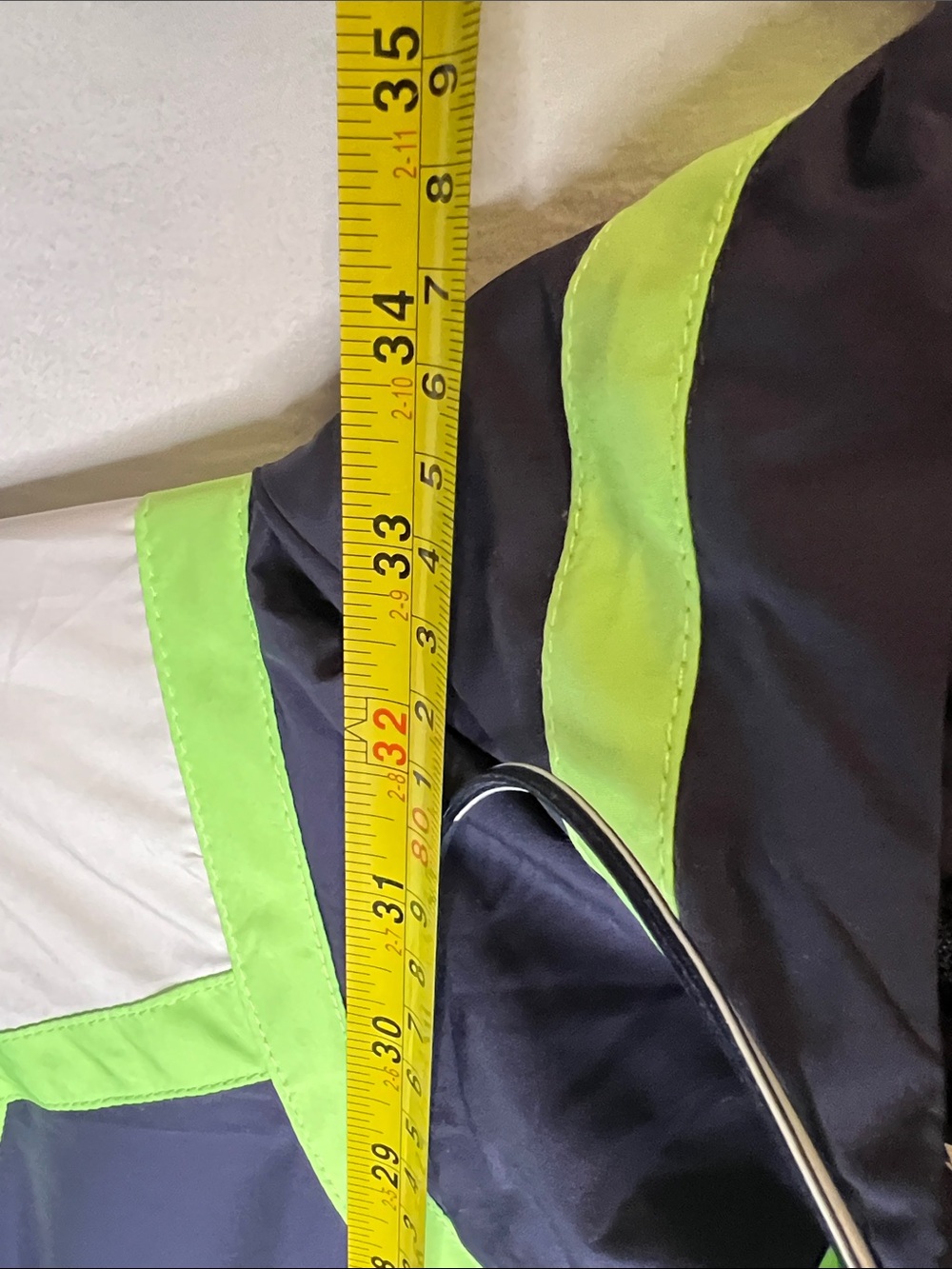 FP Movement Cares By The Wind block Logo in Navy and Lime Green Jacket. - Picture 10 of 13